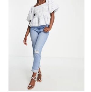 Urban Bliss slim jeans with busted knee in light wash